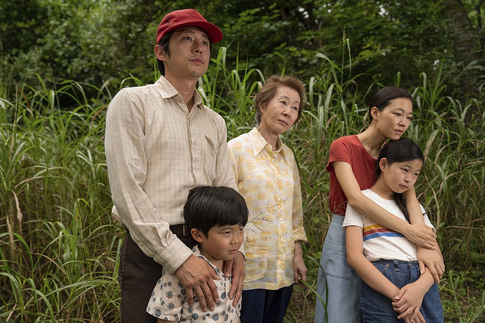 This image released by A24 shows, from left, Steven Yeun, Alan S. Kim, Yuh-Jung Youn, Yeri Han, and Noel Cho in a scene from "Minari."(Josh Ethan Johnson/A24 via AP)