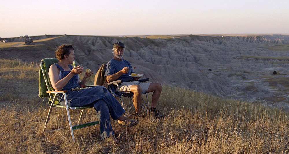 This image released by Searchlight Pictures shows Frances McDormand, left, and and David Strathairn in a scene from the film "Nomadland." (Searchlight Pictures via AP)