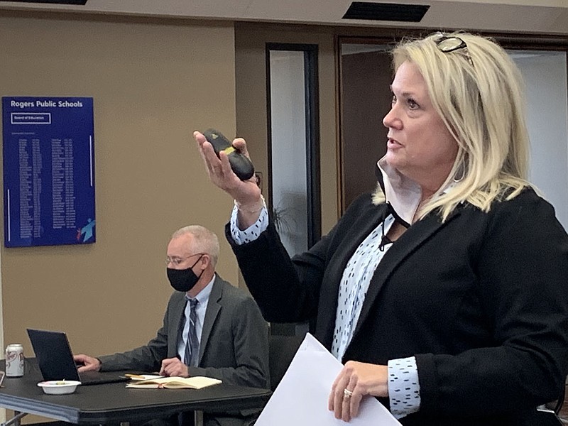 Sharla Osbourn, Elementary General Administration assistant superintendent, shares information on the district's digital learning plan Tuesday at a Rogers Public Schools board meeting. (NWA Democrat-Gazette/Mary Jordan)