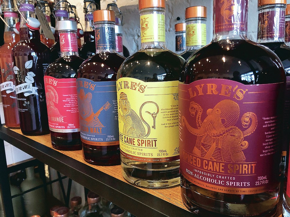This March 4, 2021 photo shows alcohol-free spirits for sale at Spirited Away, New York's first "booze-free bottle shop." According to IWSR Drinks Market Analysis, global consumption of zero-proof beer, wine and spirits is growing two to three times faster than overall alcohol consumption.(AP Photo/Joseph B. Frederick)