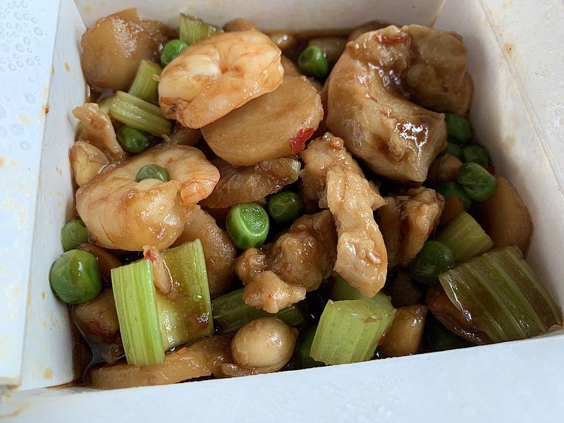 Eight Precious Wonders from Chinese Pavilion Hunan Restaurant in Sherwood featured sauteed chicken and shrimp with vegetables but was minus a couple of wonders — two kinds of mushrooms — promised on the menu. (Arkansas Democrat-Gazette/Eric E. Harrison)