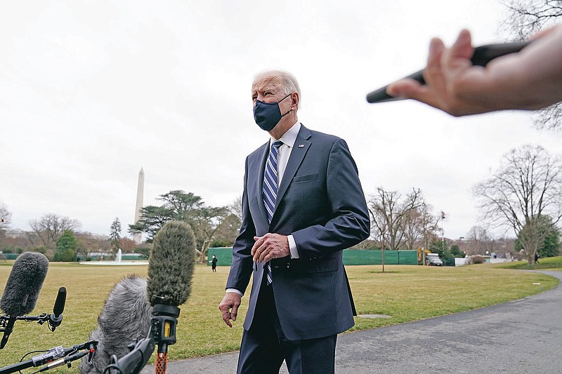 FILE - In this Tuesday, March 16, 2021 file photo, President Joe Biden speaks to members of the press on the South Lawn of the White House in Washington before boarding Marine One for a short trip to Andrews Air Force Base, Md., en route to Pennsylvania. (AP Photo/Patrick Semansky)
