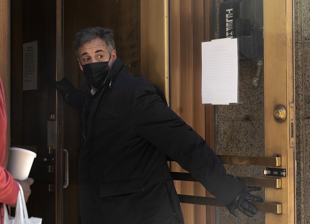 Michael Cohen, former personal attorney for Donald Trump, arrives at the Manhattan District Attorney's office, Friday, March 19, 2021, in New York. (AP Photo/Mark Lennihan)