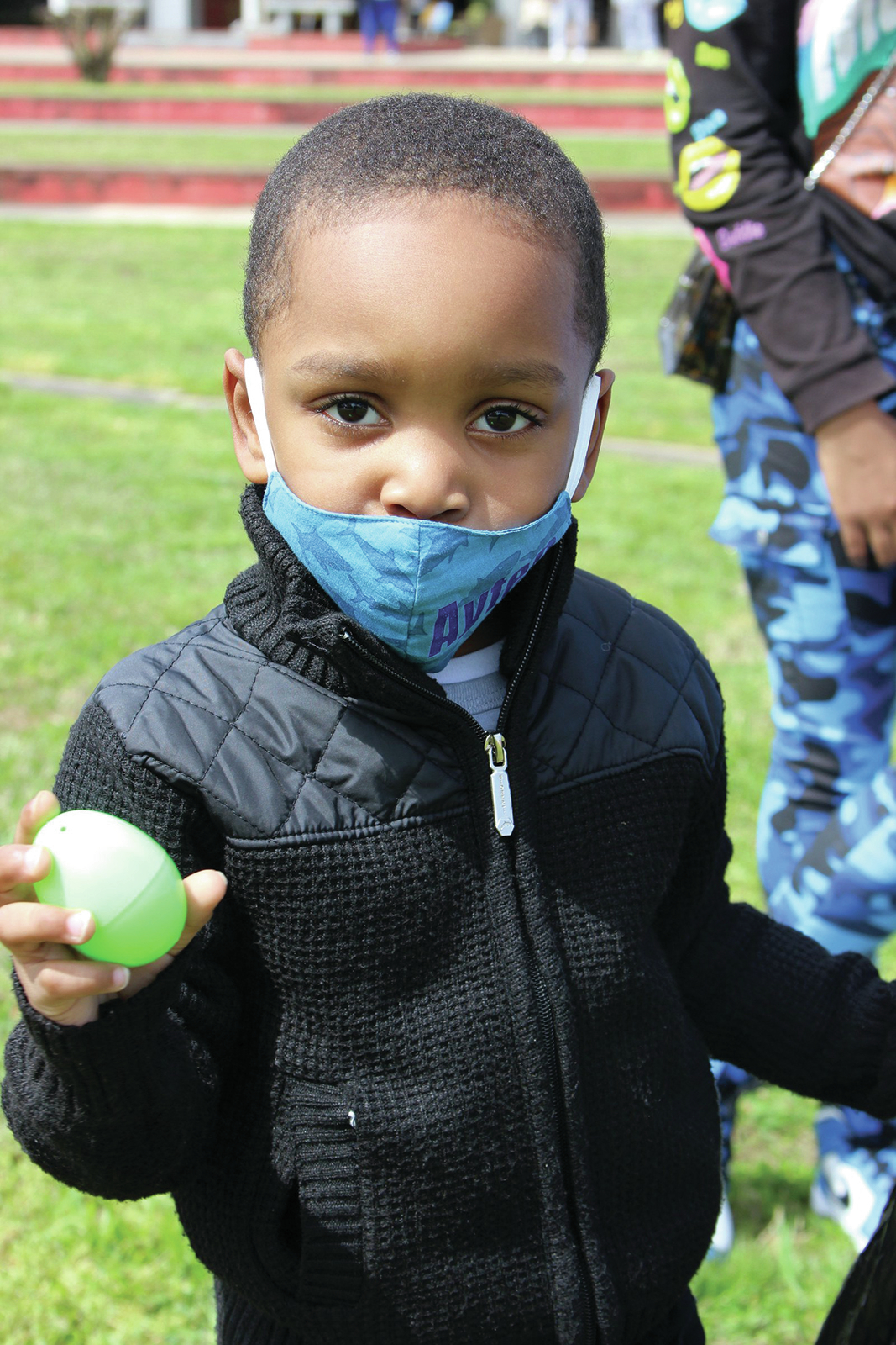 Scrambling for eggs at Easter hunt, kids see return to normal
