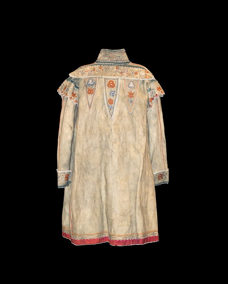 The bottom of the Huron Moose Hide Coat is decorated with a wide red silk band with white beads. (Courtesy Photo/MONAH)