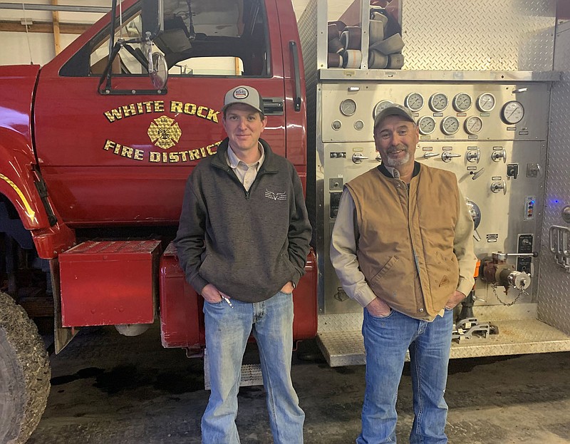 SALLY CARROLL/SPECIAL TO MCDONALD COUNTY PRESS  Josh Farmer (left) and Chris Banks have joined the White Rock Fire Department ranks, bringing a high level of real-life experiences to the volunteer posts.