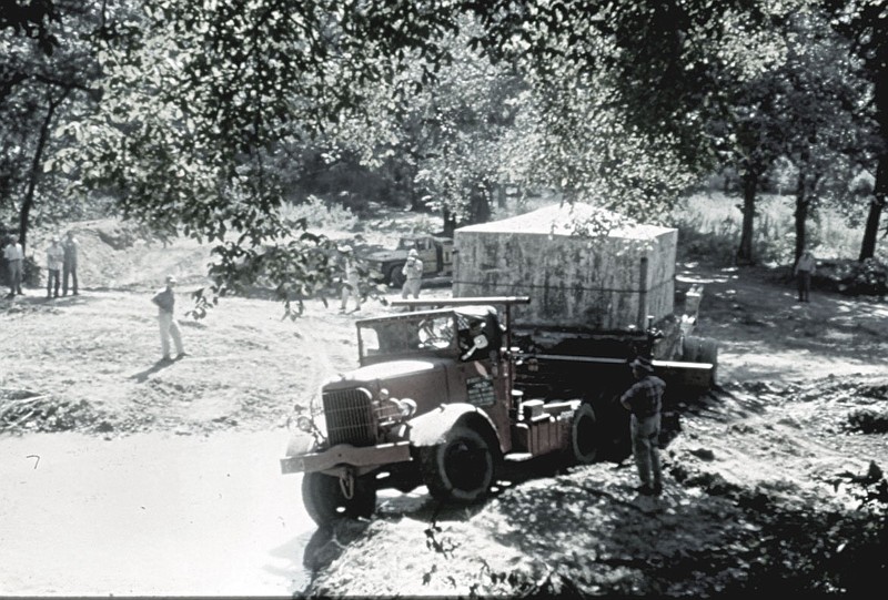 After Coin Harvey’s 40-ton tomb was placed on the house-moving truck, it then had to be transported across a creek to its final destination.

(Courtesy photo/Jim McWhorter)