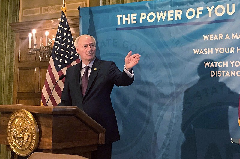 FILE - Arkansas Gov. Asa Hutchinson speaks about the coronavirus pandemic and vaccine distributions during a  news conference at the state Capitol in Little Rock on Tuesday, Jan. 12, 2021. (AP/Andrew Demillo, file)