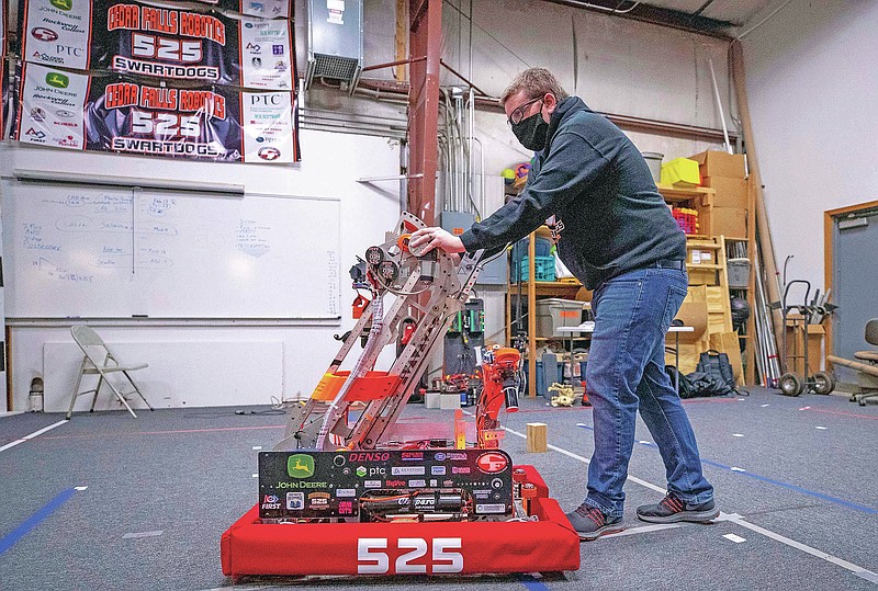 Robotics coach honored by STEM organization The Arkansas Democrat