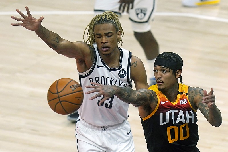 Denver Nuggets guard J.R. Smith (1) defends against Utah Jazz
