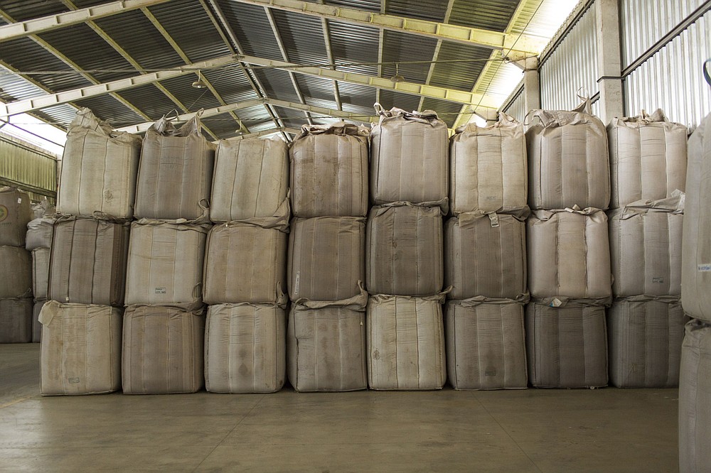 Sacks of coffee beans are ready for export in the storage area of a Dinamo Inter-Agricola Ltda. facility in Machado, Minas Gerais state, Brazil, on Feb. 28, 2018. MUST CREDIT: Bloomberg photo by Rodrigo Capote
