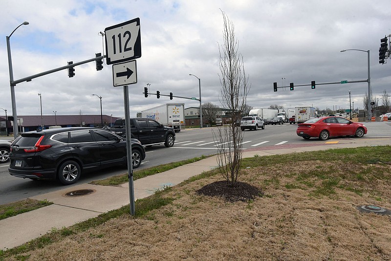 Traffic moves Tuesday March 23 2021 through the intersection of Southwest I Street and Southwest Regional Airport Boulevard in Bentonville.
(NWA Democrat-Gazette/Flip Putthoff)