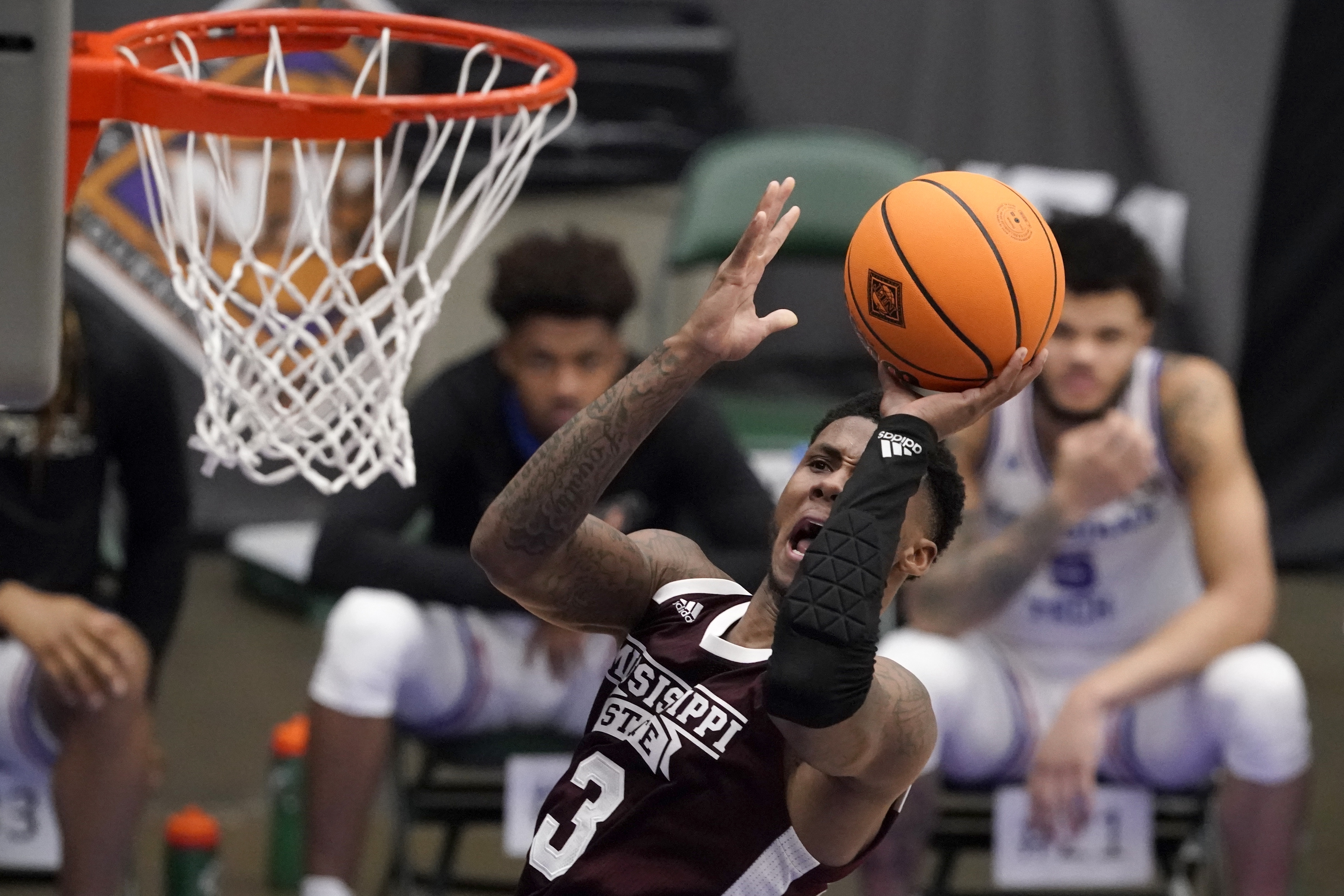 Louisiana Tech forward Kenneth Lofton Jr. advances the ball against  Mississippi State during an NCAA college basketball game in the semifinals  of the NIT, Saturday, March 27, 2021, in Frisco, Texas. (AP