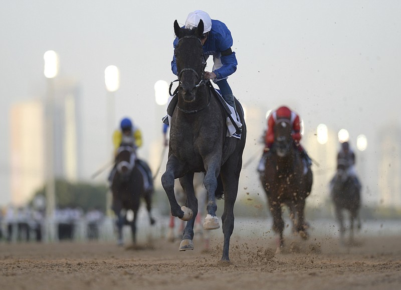 Rebel's Romance with jockey William Buick wins $750,000 Group 2 UAE Derby over 1900m (9.5 furlongs) in Dubai, the United Arab Emirates, Saturday, March 27, 2021. (AP Photo/Martin Dokoupil)