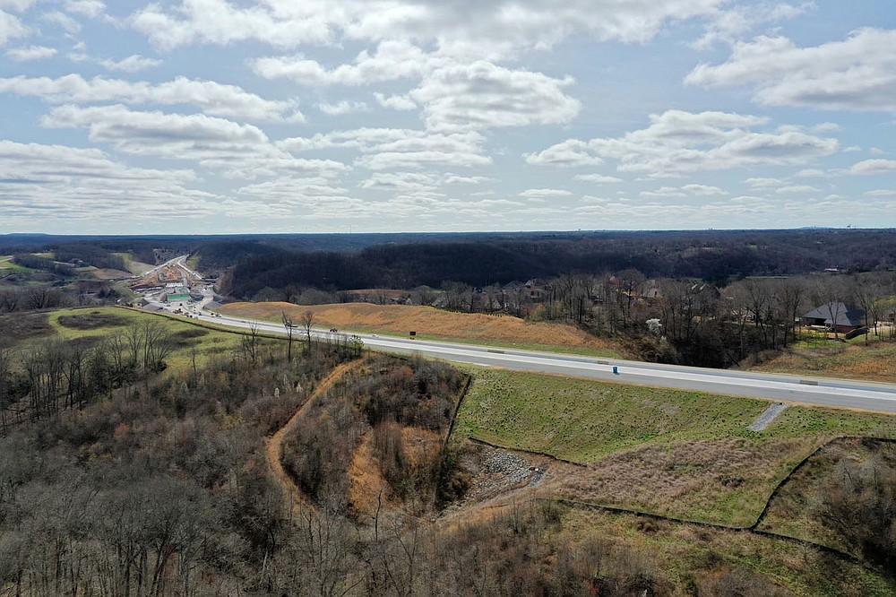 Construction of the Bella Vista Bypass, also known as the Interstate 49 Missouri/Arkansas Connector, is on schedule to be open to traffic in the fall, according to highway officials in Arkansas and Missouri. Check out nwaonline.com/210325Daily/ and nwadg.com/photos for a photo gallery.
(NWA Democrat-Gazette/Spencer Tirey)