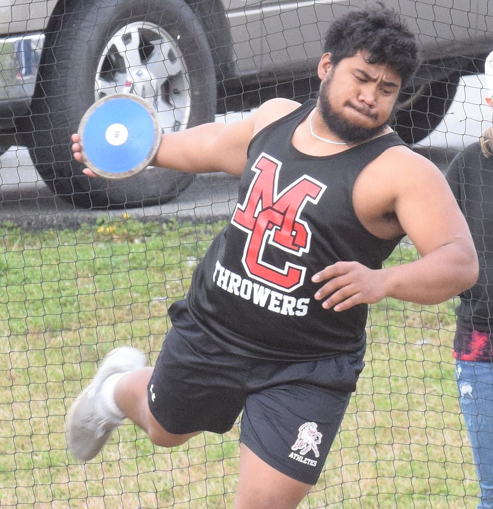 RICK PECK/SPECIAL TO MCDONALD COUNTY PRESS McDonald County's Junior Eliam picked up the Mustangs only win with a first place finish in the discus at the McDonald County Stancell Stampede held on March 25, at McDonald County High School to help the boys' team take third place in the team race.