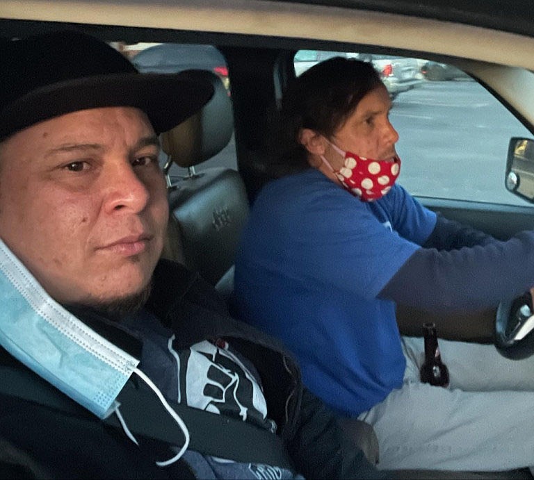 Thomas Tulensa, 36, of Springdale, and Walt Kelly, 48, of Fayetteville, make grocery deliveries to food-insecure Northwest Arkansas residents for The People’s Pantry NWA, a mutual aid food assistance organization Kelly founded and operates using community Venmo donations.
(Courtesy Photo/Walt Kelly)