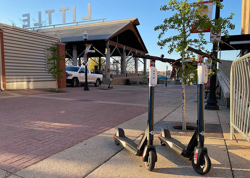 Bird scooters are shown in the Little Rock River Market district on Sunday. Photo by Joseph Flaherty