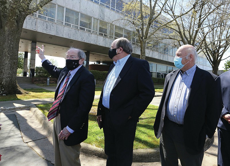Investors John Flake (from left), James Hendren and David Payne talk about their future vision on Monday, March 29, 2021, for the AP&L building in Little Rock they recently purchased. 
(Arkansas Democrat-Gazette/Thomas Metthe)