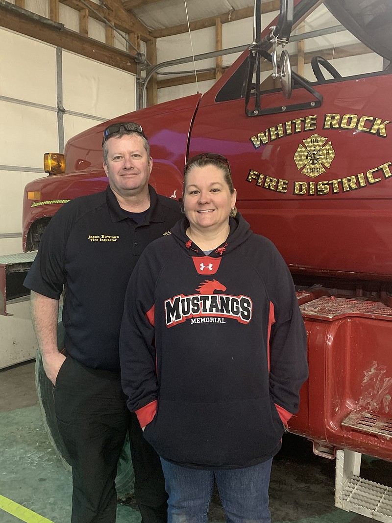 SALLY CARROLL/SPECIAL TO MCDONALD COUNTY PRESS White Rock Fire Department volunteer Amber Bowman goes on fire calls, as well as helping out behind the scenes. She and her husband, White Rock Fire Chief Jason Bowman, serve the community through their efforts with the department.