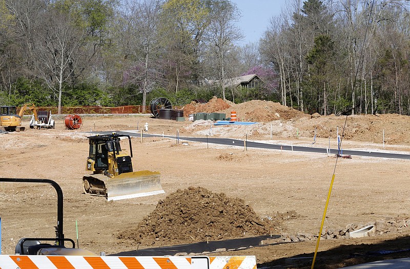 Infrastructure work continues Thursday, April 1, 2021, on the first phase of the development on Markham Hill near the intersection of Markham Road and Cross Avenue in Fayetteville. Check out nwadg.com/photos for a photo gallery.
(NWA Democrat-Gazette/David Gottschalk)