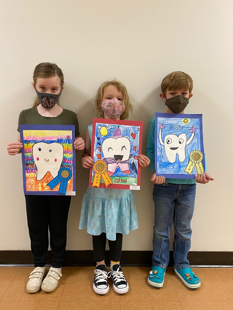 Gandy Elementary School kindergarten winners in the Dental Health Art Contest are Bree McEntire, Aubrey Abrams and Owen Dill. (Special to The Commercial)