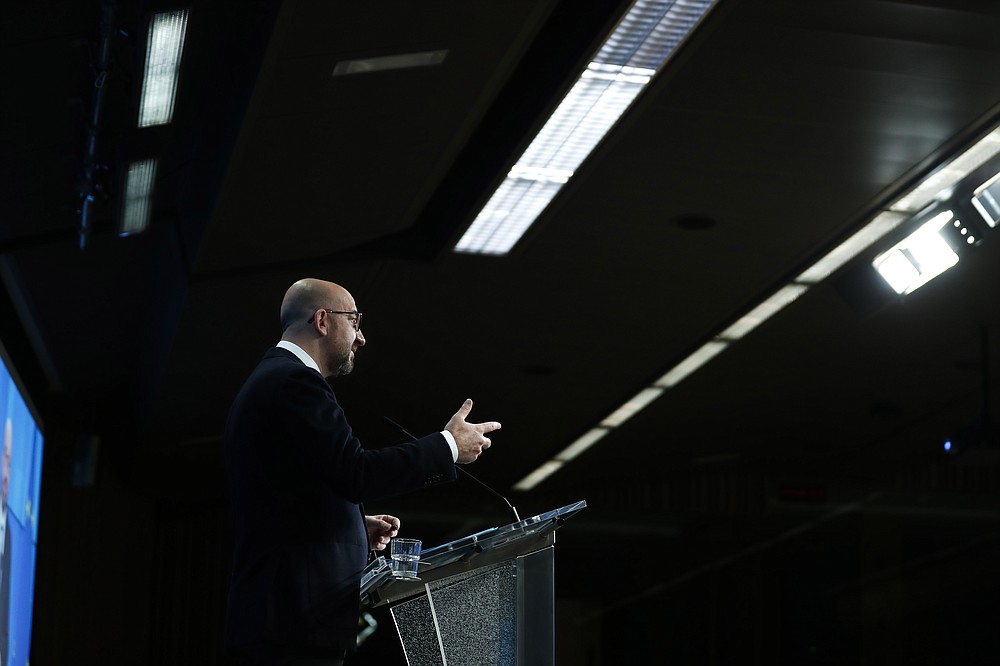 European Council President Charles Michel speaks during an online joint press conference with Director General of the World Health Organization Tedros Adhanom Ghebreyesus at the European Council headquarters in Brussels, Tuesday, March 30, 2021. (AP Photo/Francisco Seco, Pool)