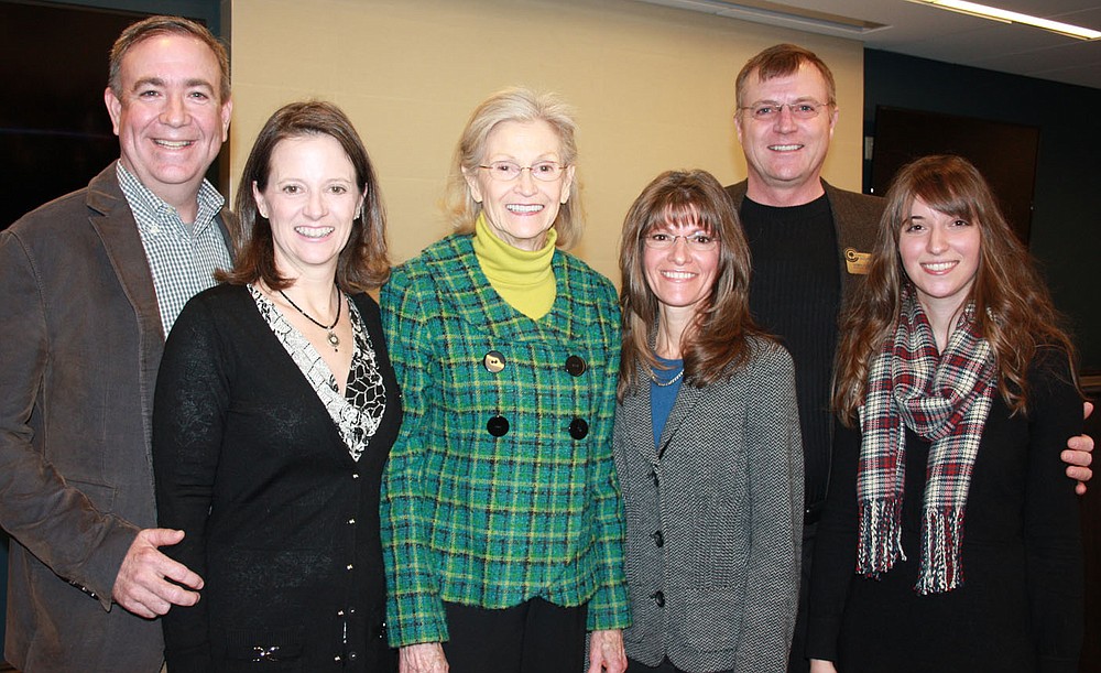 STAFF PHOTO CARIN SCHOPPMEYER Lamar and Shari Steiger, from left, Melba Shewmaker, Dayle and Dan Shewmaker and Amy Benincosa gather at the gand opening of the National Child Protection Training Center on Feb. 6 on the NorthWest Arkansas Community College campus in Bentonville.