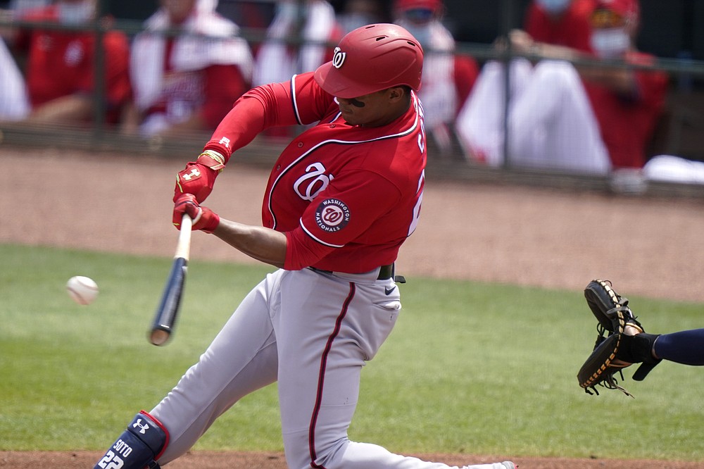Washington Nationals' Juan Soto grounds out to second during the third inning of a spring training baseball game against the St. Louis Cardinals, Monday, March 15, 2021, in Jupiter, Fla. (AP Photo/Lynne Sladky)
