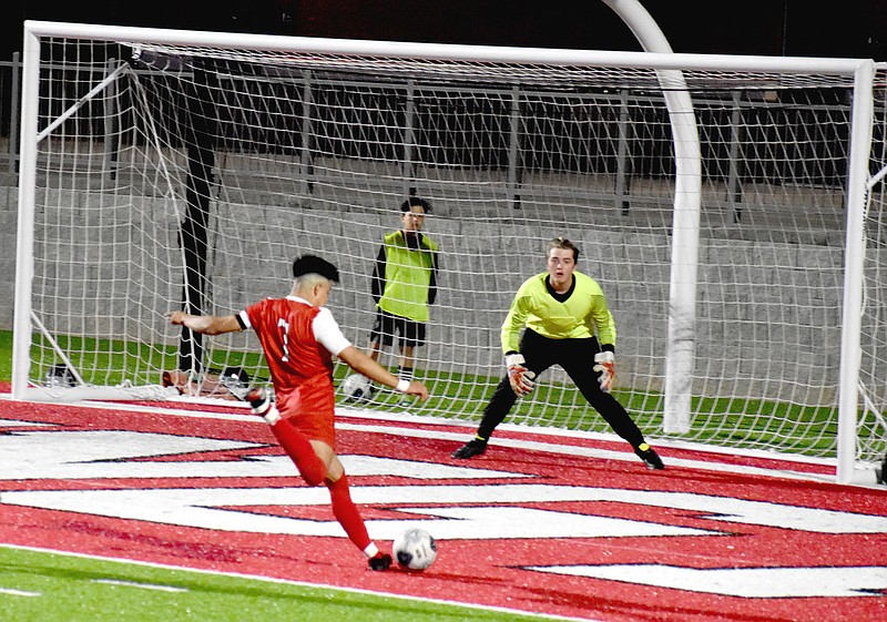 MARK HUMPHREY  ENTERPRISE-LEADER/Farmington senior forward Toni Cervantes breaks on the goal and scores to put the Cardinals ahead of Gentry, 6-0, with 29:57 remaining in the second half of a 7-2 victory over the Pioneers on Monday, March 29, at Cardinal Stadium.