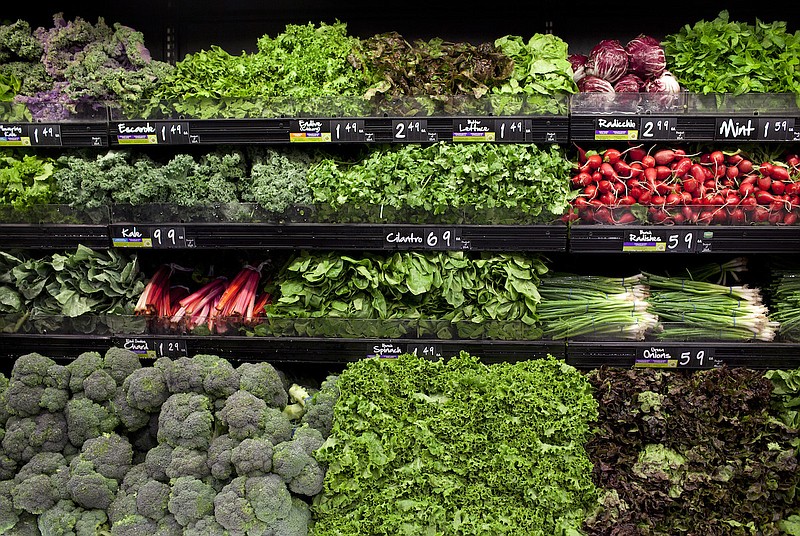 Buying in-season fresh fruit and vegetables helps reduce grocery bills. (The New York Times/Tim Gruber)