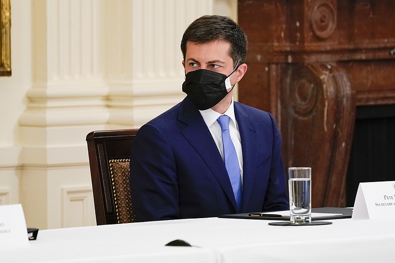 Secretary of Transportation Secretary Pete Buttigieg attends a Cabinet meeting with President Joe Biden in the East Room of the White House, Thursday, April 1, 2021, in Washington. (AP Photo/Evan Vucci)