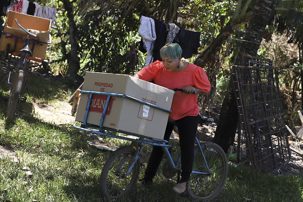 The Associated Press
Iris Franco is seen at her home in El Ranchador, Santa Ana, El Salvador, on Friday, March 5. Franco runs a bakery at home and delivers the bread on a bike. The Salvadoran family lives humbly but is in a better place thanks to financial support from a family member in the United States who is part of the Temporary Protected Status program.
