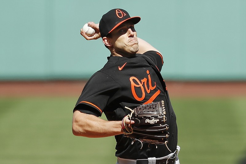 Baltimore Orioles' John Means pitches during the first inning of an opening day baseball game against the Boston Red Sox, Friday, April 2, 2021, in Boston. (AP Photo/Michael Dwyer)