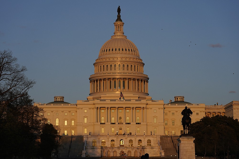 The American flag at the U.S. Capitol flies at half-staff in honor of Capitol Police officer William Evans who was killed after a man rammed a car into two officers at a barricade outside the U.S. Capitol in Washington, Friday, April 2, 2021. (AP Photo/Alex Brandon)
