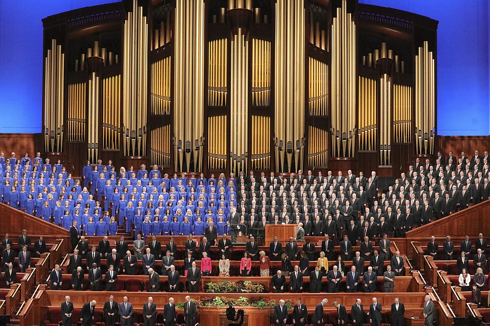 FILE - In this Oct. 5, 2019 file photo, the Tabernacle Choir at Temple Square perform during The Church of Jesus Christ of Latter-day Saints' twice-annual church conference in Salt Lake City. For the third consecutive time, The Church of Jesus Christ of Latter-day Saints will hold its signature conference this weekend without attendees in person as the faith continues to take precautions amid the pandemic. Members of the Utah-based faith will instead watch on TVs, computers and tablets from their homes around the world Saturday, April 3, 2021 to hear spiritual guidance from the religion's top leaders, who will be delivering the speeches in Salt Lake City. (AP Photo/Rick Bowmer, File)