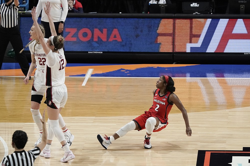 Arizona guard Aari McDonald (2) watches after missing a shot at the end of the championship game against Stanford in the women's Final Four NCAA college basketball tournament, Sunday, April 4, 2021, at the Alamodome in San Antonio. Stanford won 54-53. (AP Photo/Morry Gash)