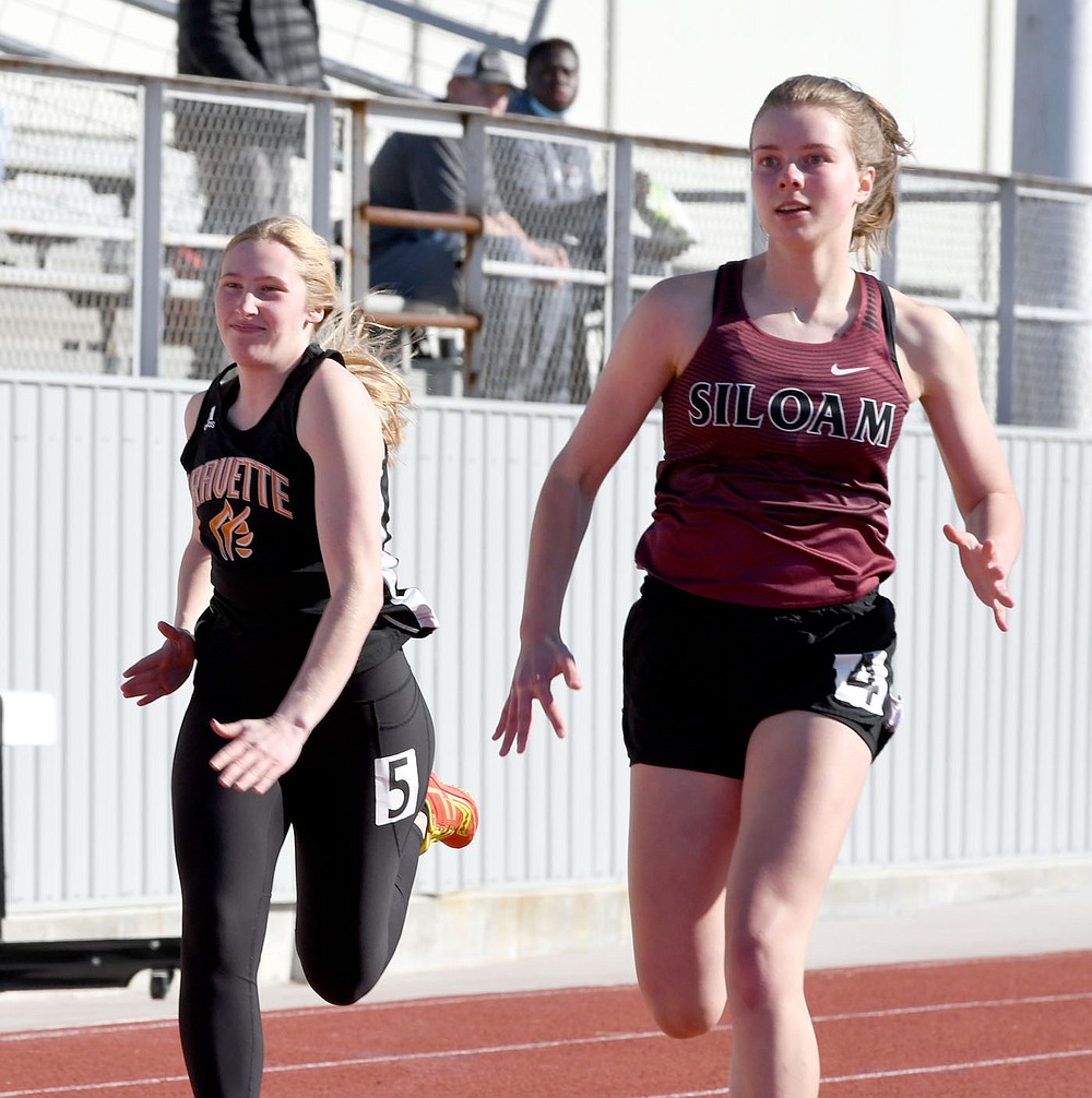 Bud Sullins/Special to the Herald-Leader
Esther Norwood runs in the Panther Relays on April 1 at Glenn W. Black Stadium.
