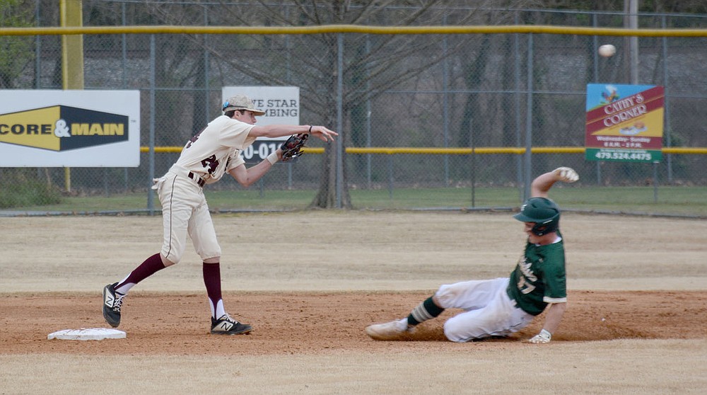 Graham Thomas/Herald-Leader
Siloam Springs sophomore second baseman Nick Driscoll throws to first against Alma on March 30.