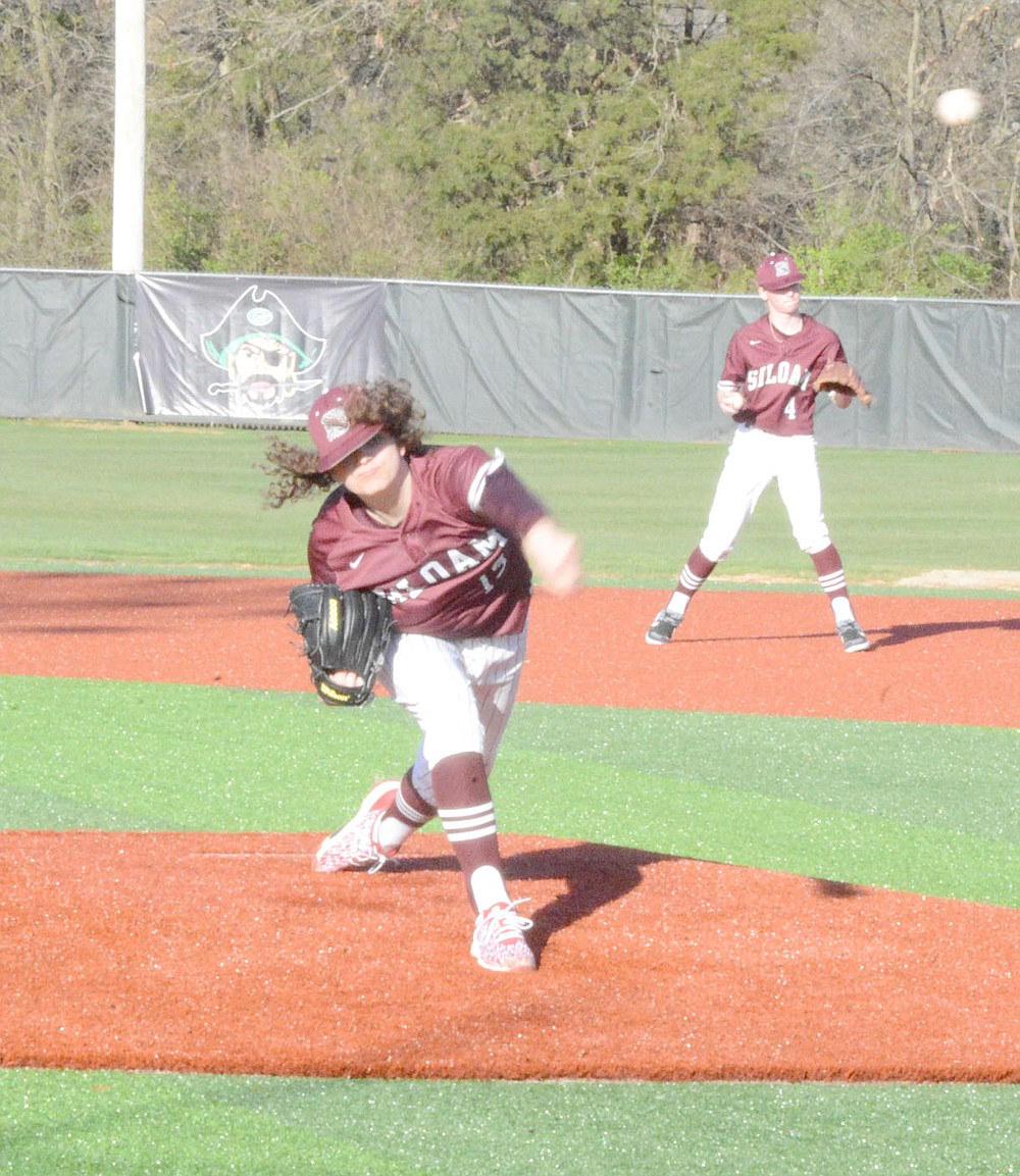 Graham Thomas/Herald-Leader
Siloam Springs sophomore Spencer Stephenson throws a pitch against Pea Ridge in a game played at Greenland on March 26.