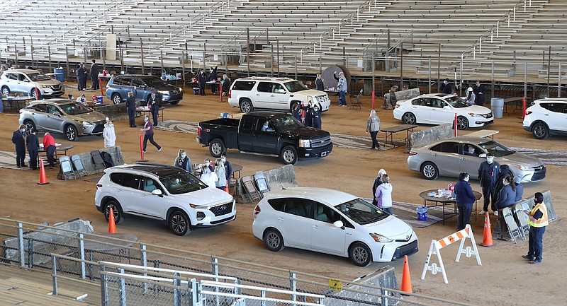 A COVID-19 vaccination clinic is held at the Garland County Fairgrounds on Feb. 23. - File photo by The Sentinel-Record