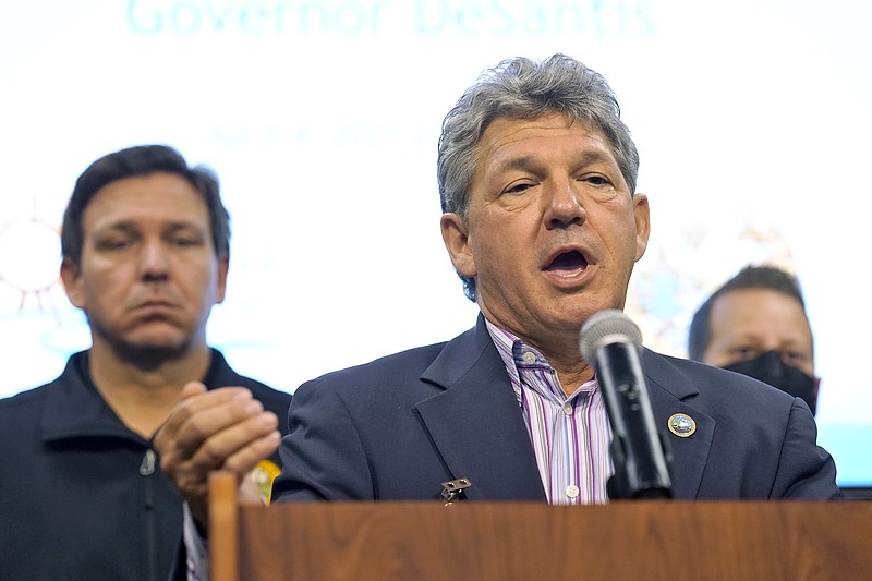 Acting Manatee County Administrator Dr. Scott Hopes speaks during a news conference Sunday, April 4, 2021, at the Manatee County Emergency Management office in Palmetto, Fla. Florida Gov. Ron DeSantis declared a state of emergency Saturday after a leak at a large pond of wastewater threatened to flood roads and burst a system that stores polluted water. (AP Photo/Chris O'Meara)