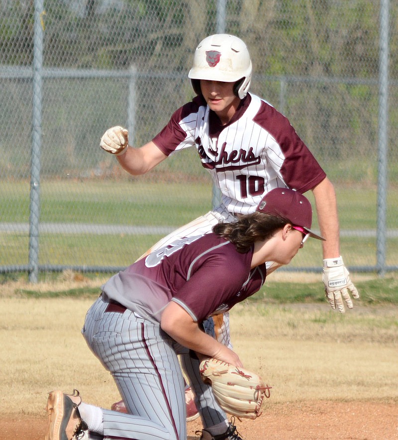 Graham Thomas/Herald-Leader
Siloam Springs senior Gavin Henson gets up after sliding into third base as Morrilton's Beau McElroy fields a throw Monday. The Panthers defeated the Devil Dogs 11-1.