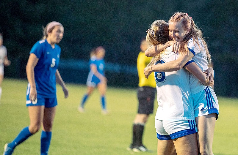 Photo courtesy of JBU Sports Information
John Brown women's soccer players Lauren Walter and Sienna Carballo embrace after a Lady Golden Eagles goal Monday in a 4-0 win against Oklahoma City in the semifinals of the Sooner Athletic Conference Tournament at Alumni Field.