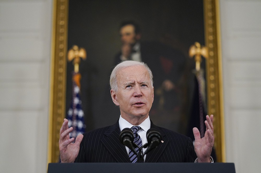 President Joe Biden delivers remarks about vaccinations, in the State Dining Room of the White House, Tuesday, April 6, 2021, in Washington. (AP Photo/Evan Vucci)