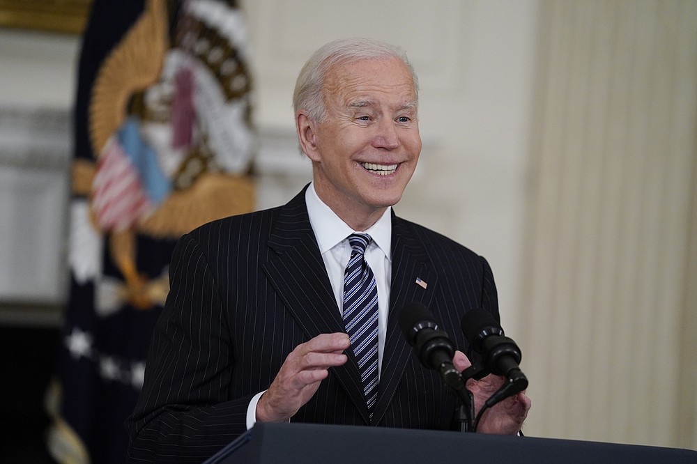 President Joe Biden delivers remarks about vaccinations, in the State Dining Room of the White House, Tuesday, April 6, 2021, in Washington. (AP Photo/Evan Vucci)