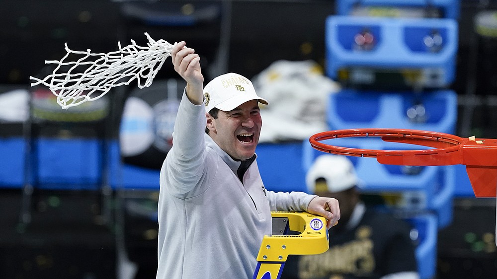 Baylor head coach Scott Drew cuts down the net after the championship game against Gonzaga in the men's Final Four NCAA college basketball tournament, Monday, April 5, 2021, at Lucas Oil Stadium in Indianapolis. Baylor won 86-70. (AP Photo/Darron Cummings)