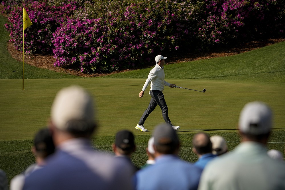 Rory McIlroy, of Northern Ireland, walks across the green on the 13th hole during a practice round for the Masters golf tournament on Tuesday, April 6, 2021, in Augusta, Ga. (AP Photo/David J. Phillip)