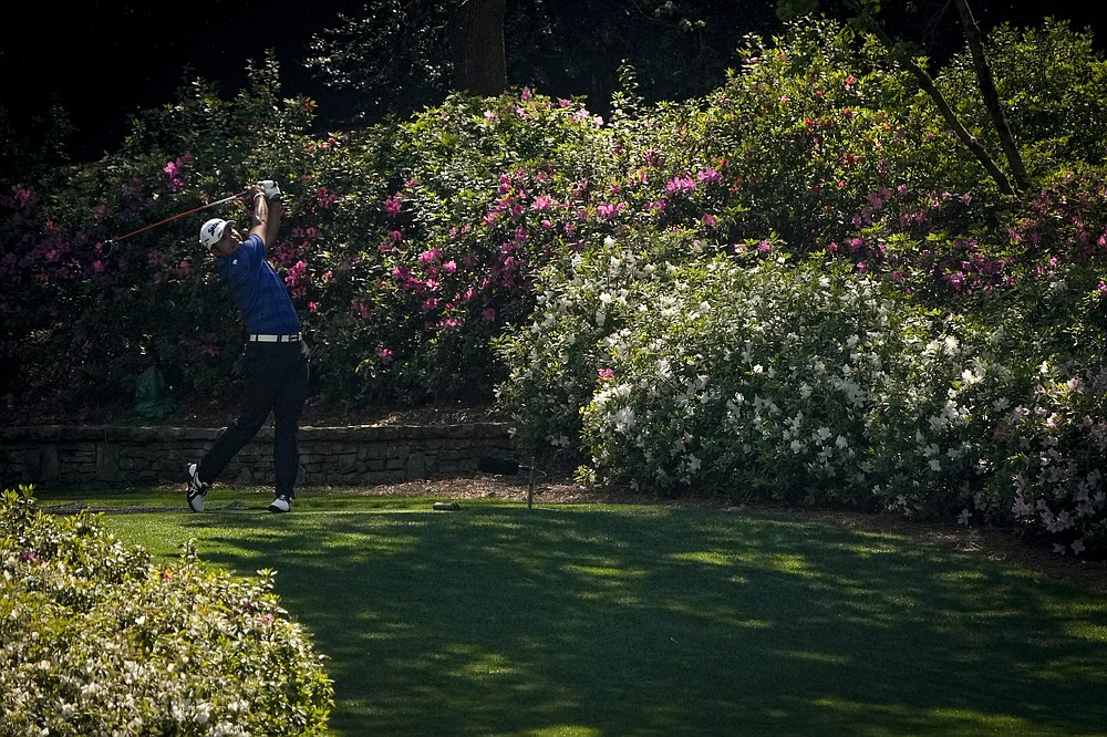 Hideki Matsuyama, of Japan, watches his tee shot on the 13th hole during a practice round for the Masters golf tournament on Tuesday, April 6, 2021, in Augusta, Ga. (AP Photo/Gregory Bull)