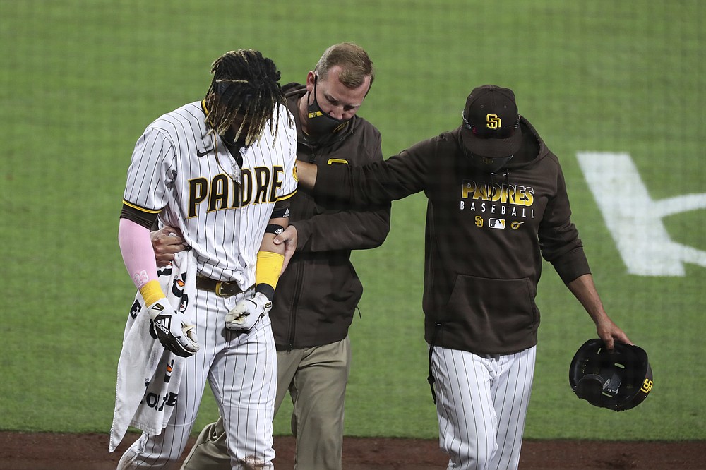 San Diego Padres' Fernando Tatis Jr., right, and Rougned Odor (24